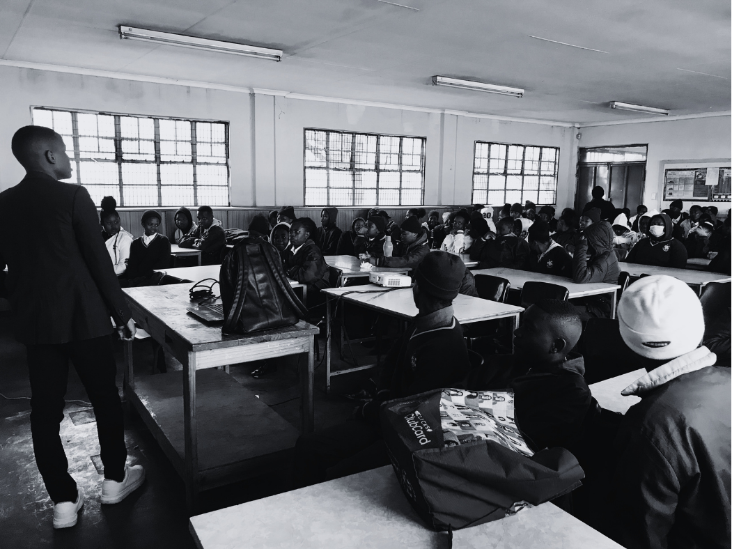 An EduReach360 facilitator engaging learners in a classroom session
